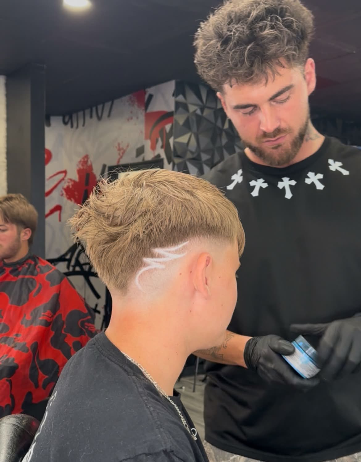 FadedHQ barber working with precision